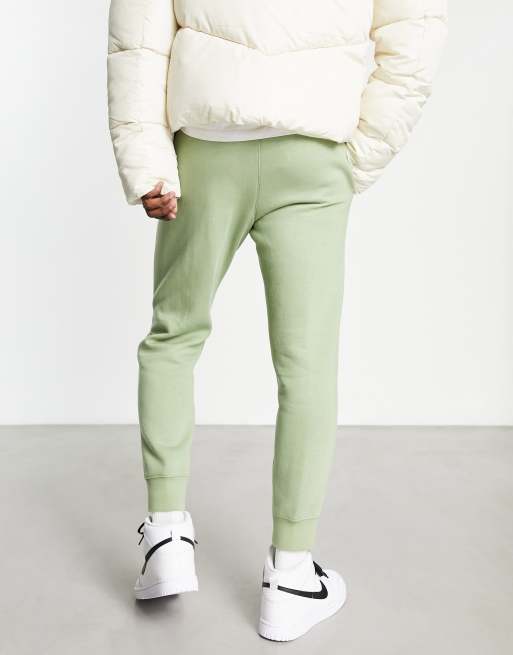 Nike Club fleece joggers in green ASOS