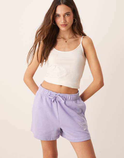 Nike Club fleece retro logo shorts in purple 
