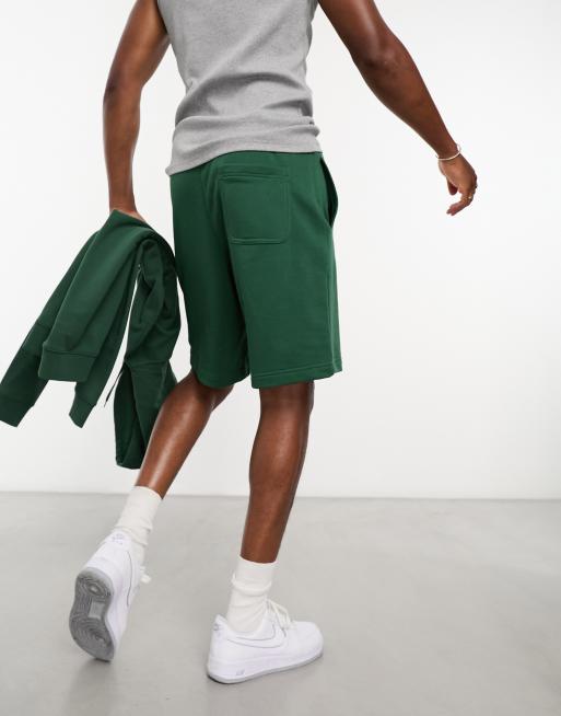 Nike Club fleece shorts in green ASOS