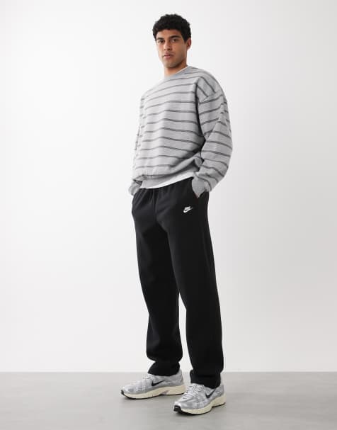 Nike Club fleece straight leg logo joggers in black - view 1
