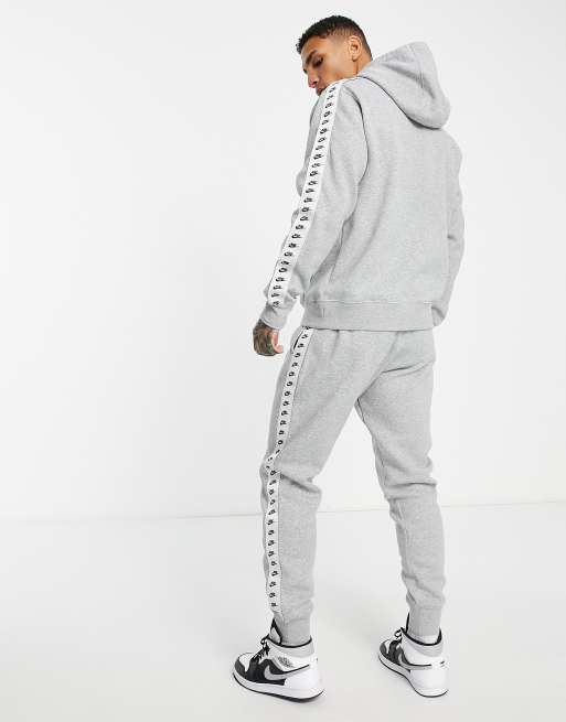 Nike striped outlet tracksuit