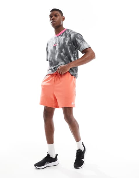 Nike Club French Terry shorts in orange 
