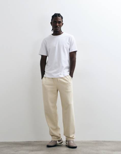 Nike Club French Terry straight leg logo joggers in light beige - view 1