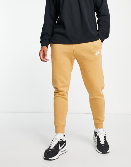 Nike best sale gold joggers