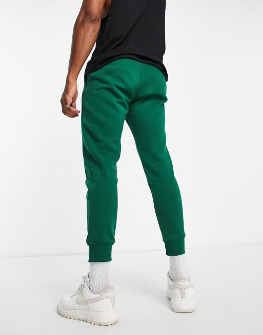 Dark green nike joggers sale