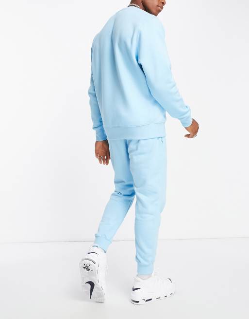 Nike blue best sale jogging bottoms