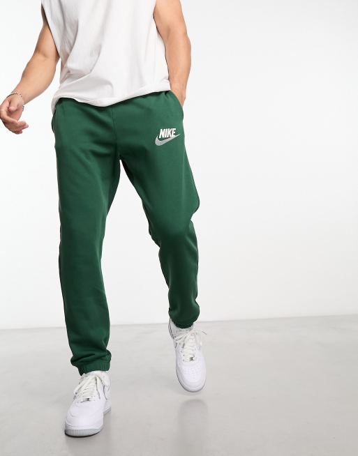 Pantaloni nike verdi store strisce bianche