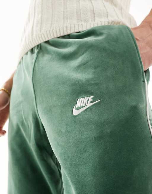 Nike Club Joggers verdi in velour