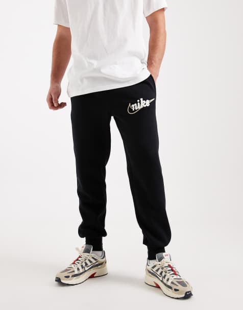 Nike Club joggers with swoosh detail in black