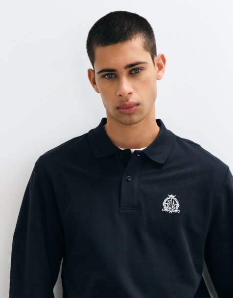 Nike Club long sleeve polo in black 