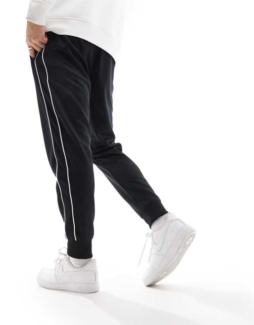 Nike Running Dri-FIT sweatpants in black