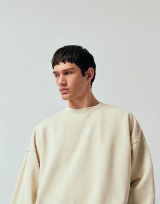 Club - Oversize-Sweatshirt aus French Terry in Beige-Neutral Neutral S