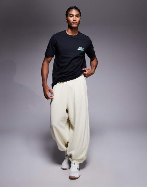 Nike Club oversized joggers in beige - view 1