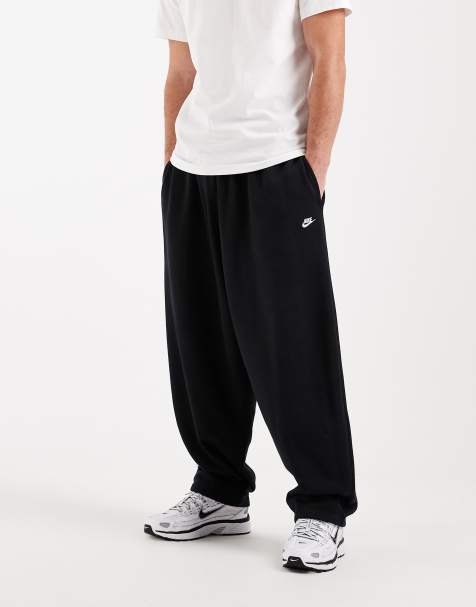 Nike Club oversized pants in black - view 1