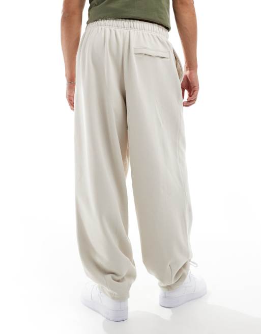 Nike Club oversized sweatpants in beige