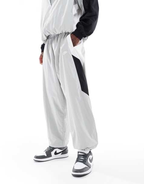 Nike Club oversized tracksuit bottoms in grey - view 1