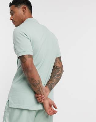 Nike Club polo shirt in dusty green | ASOS