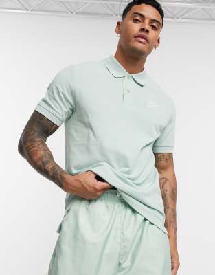 green nike polo