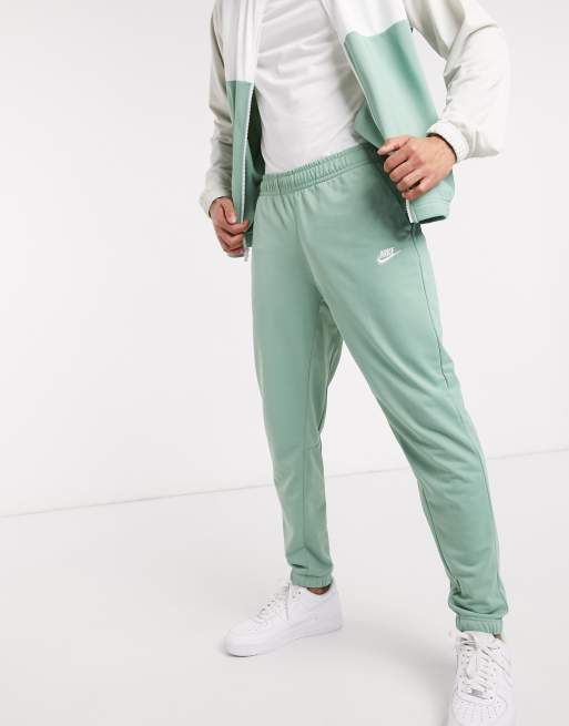 Nike Club polyknit tracksuit set in dusty green