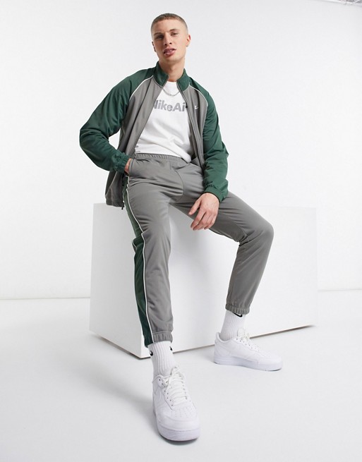 Nike Club polyknit tracksuit set in grey | Monroe Clothing