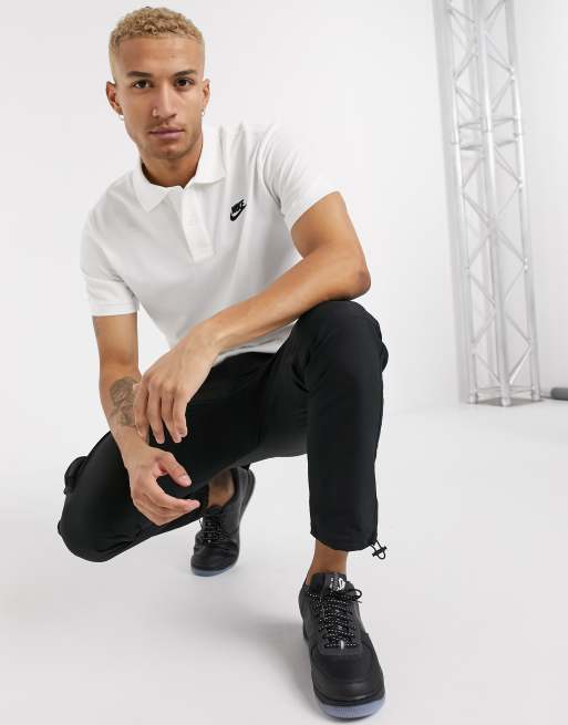 Nike polo with shoe on sale logo