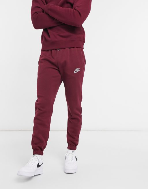 nike club cuffed joggers in burgundy