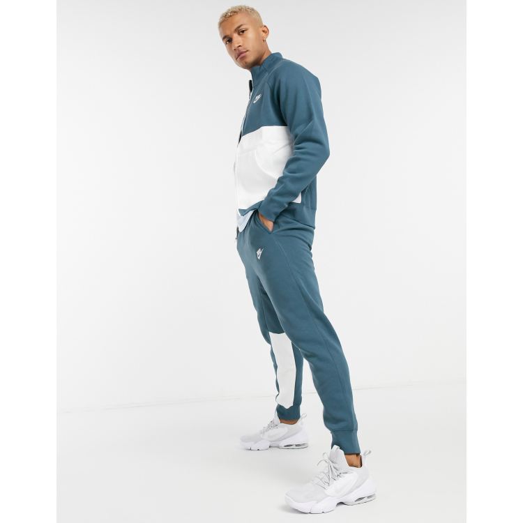 Survetement nike bleu et noir sale