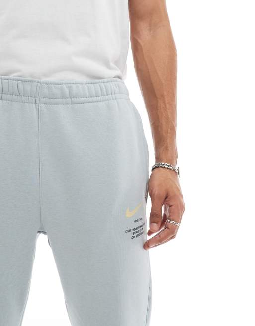 Nike Club Swoosh graphic joggers in light blue , 4 of 5