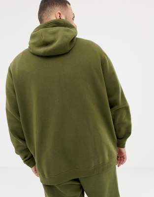 nike club swoosh zip through hoodie in green