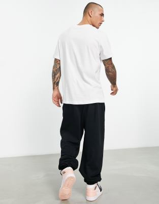 T-shirt bianca con logo arancione-Bianco - Nike T-shirt donna  - immagine1