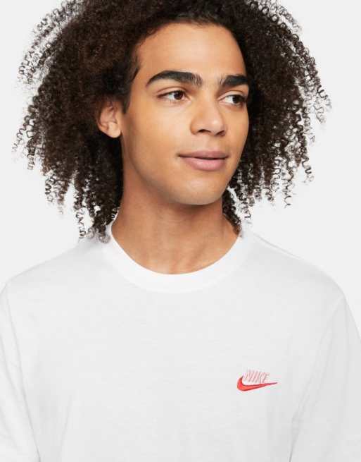 White nike shirt store with pink check