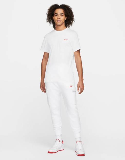 White nike shirt with pink clearance logo