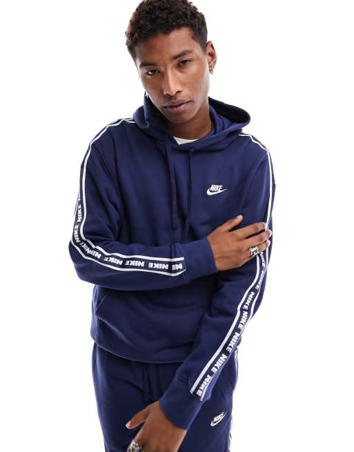 Nike taped tracksuit blue hotsell