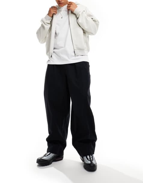 Nike Club woven balloon pants in black - view 1
