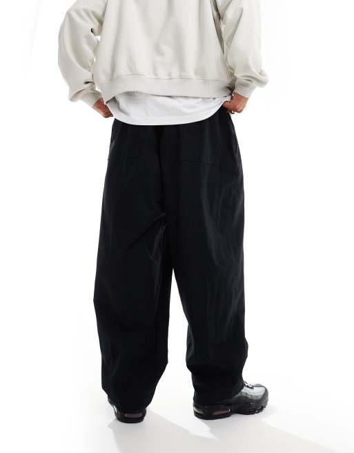 Nike Club woven balloon pants in black | ASOS