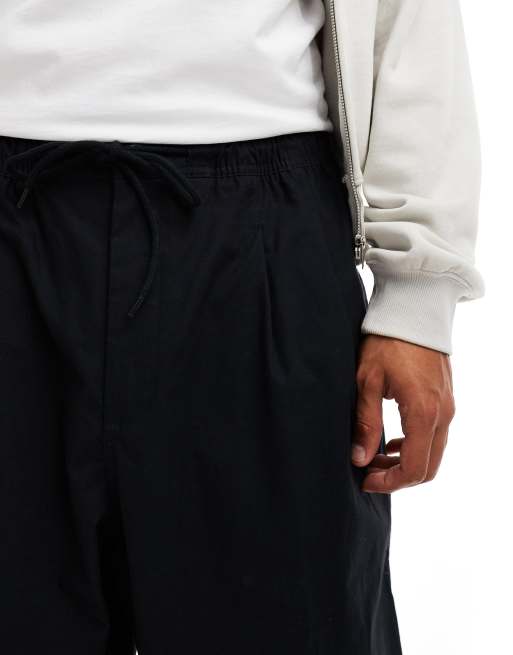 Nike Club woven balloon trousers in black