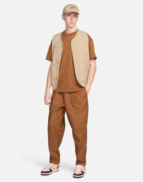 Nike Club woven Barcelona pants in brown - view 1