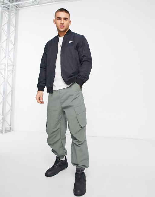 Nike Club woven bomber jacket in black | ASOS