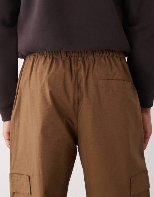 Nike Club woven cargo pants in brown | ASOS