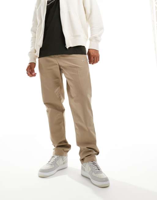 khaki pants red and white polo shoes