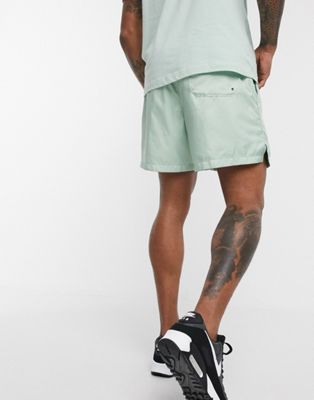 nike green woven shorts