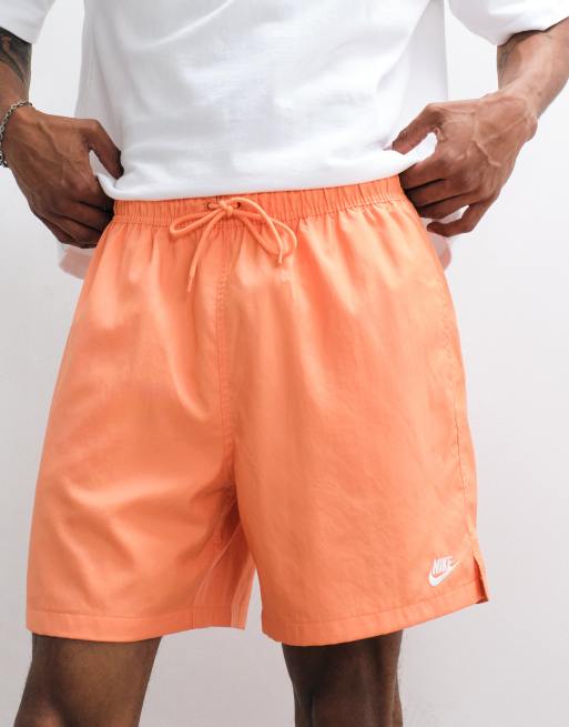 Nike Club Woven shorts in orange | ASOS