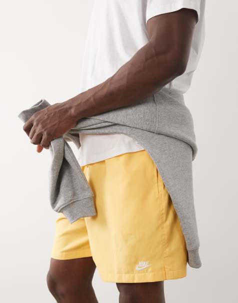 Nike Club Woven shorts in yellow