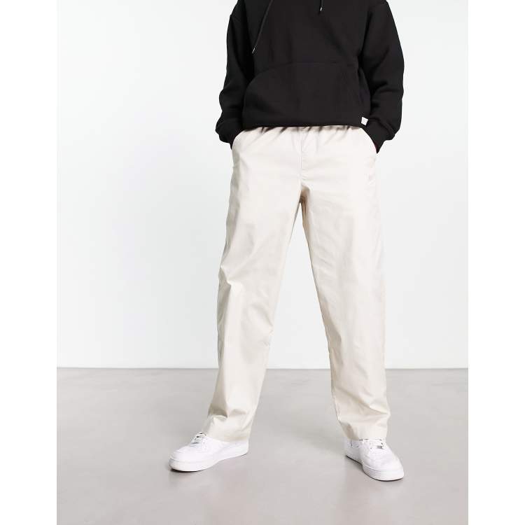 Nike Sportswear Tapered Trousers in Cream