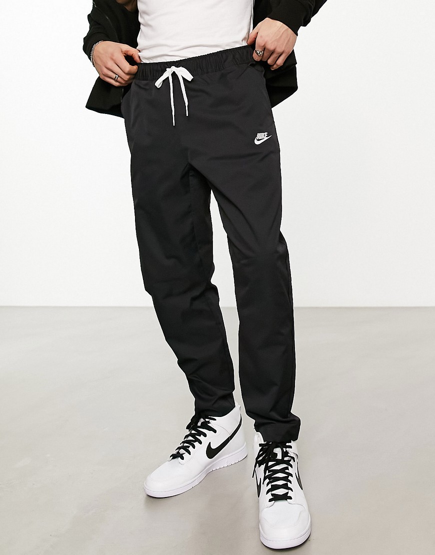 Nike Club woven tapered trousers in black