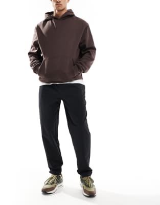 Nike Nike Club woven tapered trousers in black