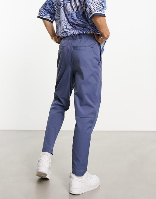 Nike Club woven tapered trousers in blue