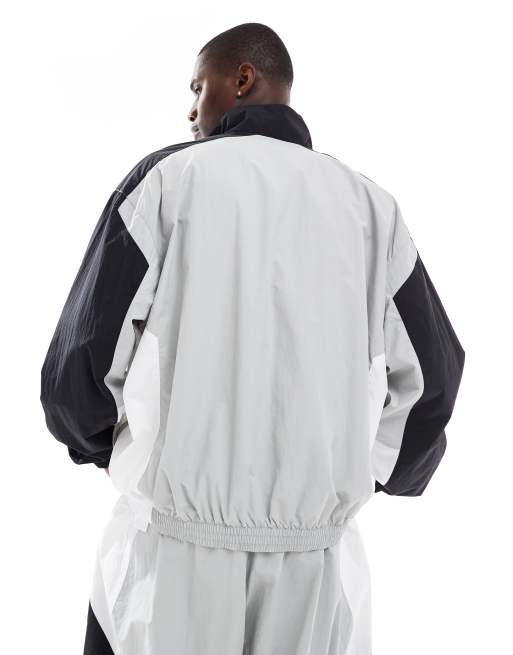 Nike Club woven track jacket in black & gray