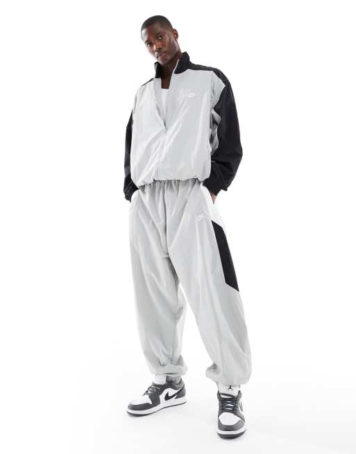 Nike Club woven track jacket in black & gray