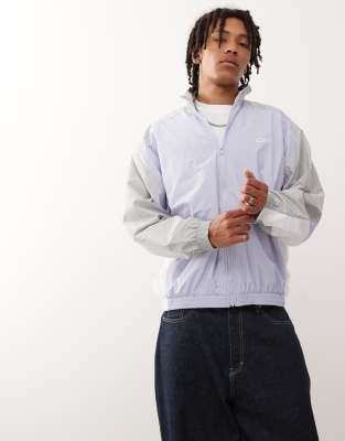 Nike Club woven track jacket in blue & gray